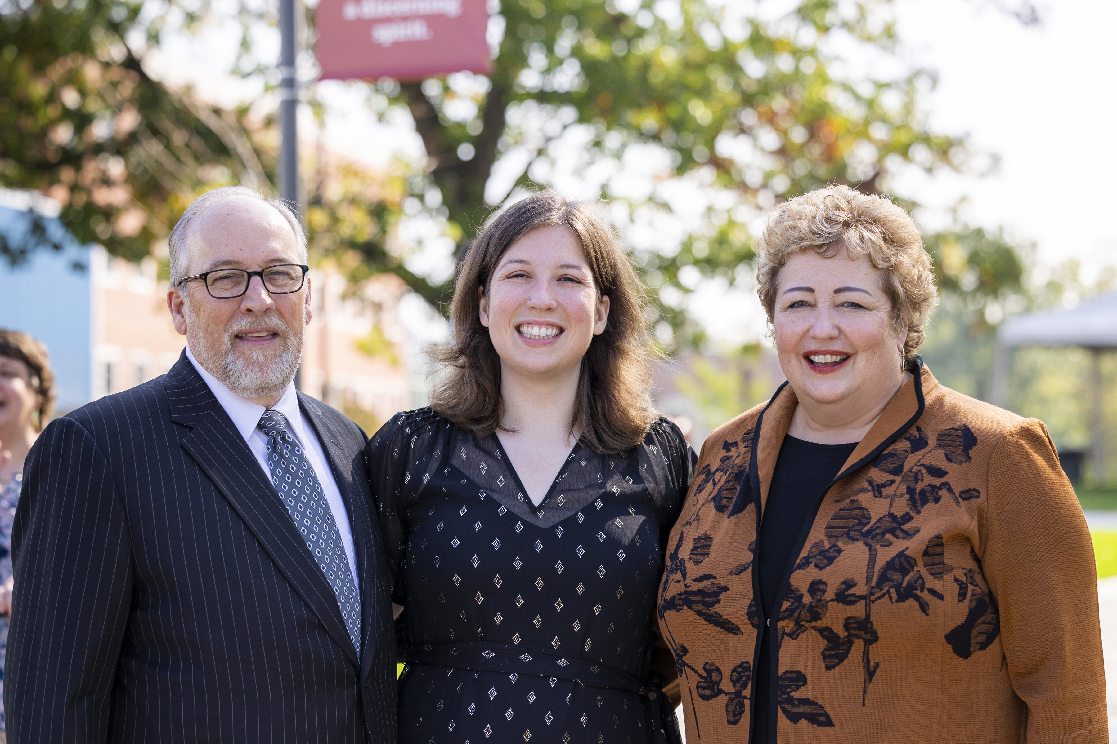 Photo of Kelly Phipps, Brooke Phipps, and Kim Phipps at the AWC dedication in 2021
